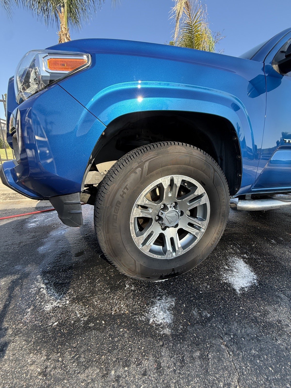 Toyota 4Runner after exterior detail in Chula Vista — deep metallic blue shine and clean wheel