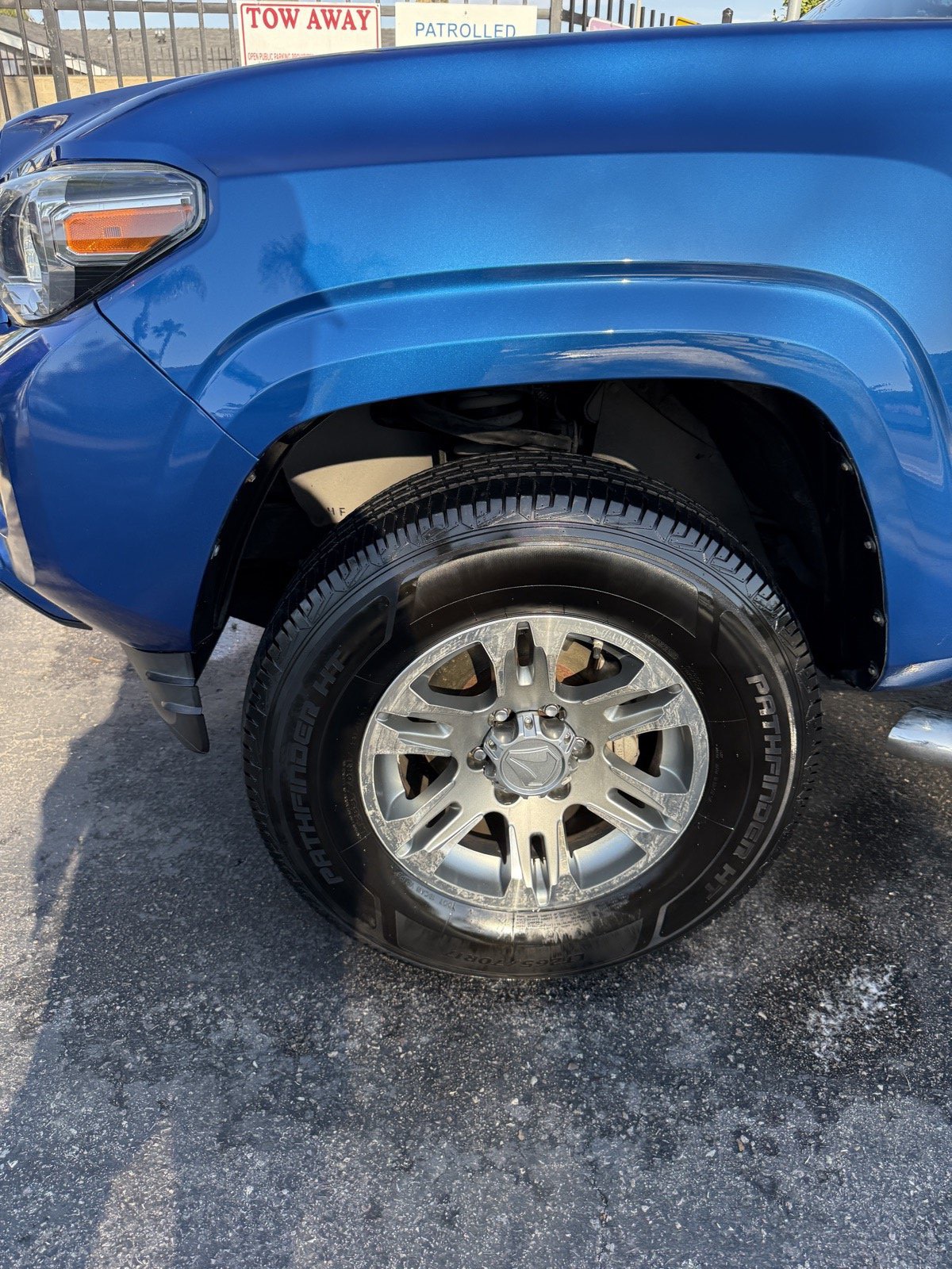 Close-up of detailed Toyota 4Runner wheel with tire dressing