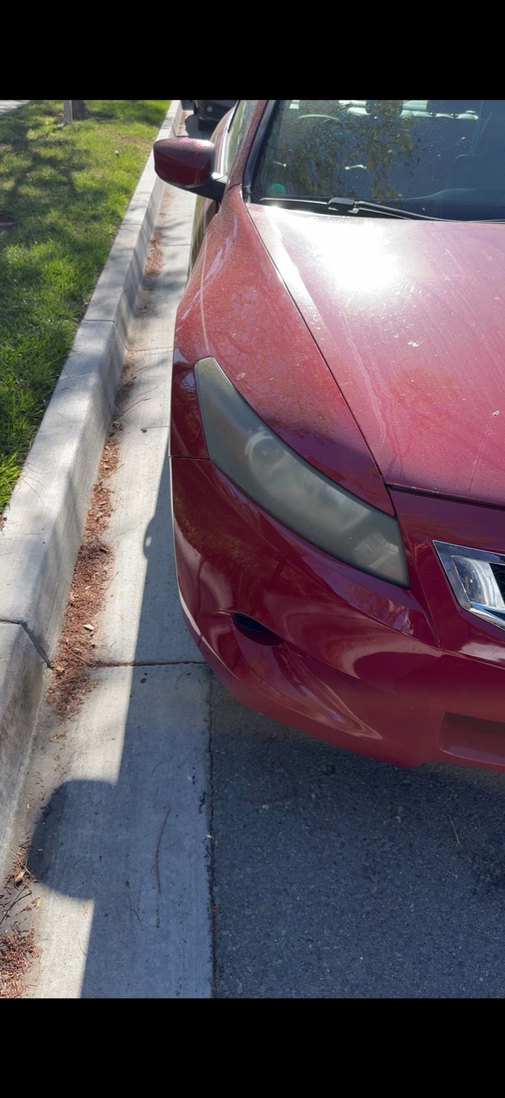 Honda Accord with oxidized, cloudy headlights before restoration