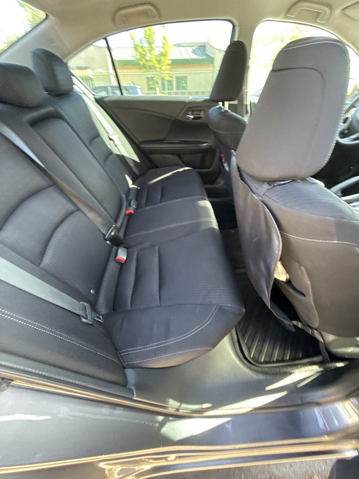 Same Honda Accord back seats after full interior detail — deep vacuum, shampoo, and conditioning
